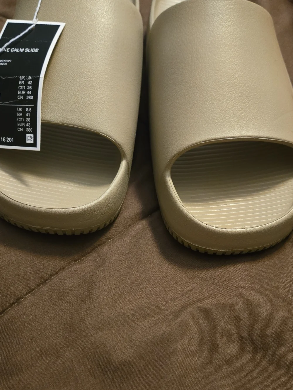 Nike Calm Slide Sandals in Taupe.  Size 10 NEW WITH TAGS.